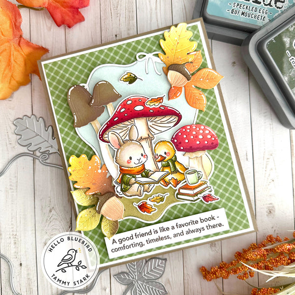 Card with autumn-themed illustration of animals and mushrooms.