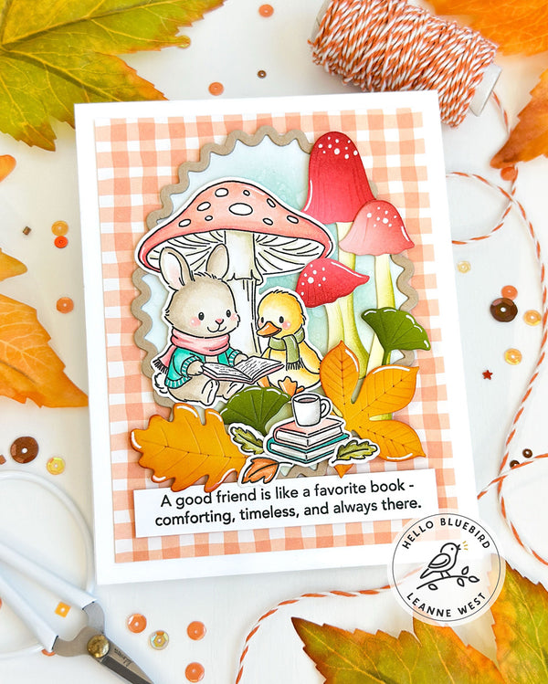 Card with bunny and duckling illustrations under mushrooms on a checkered background, surrounded by autumn leaves and decorative elements.